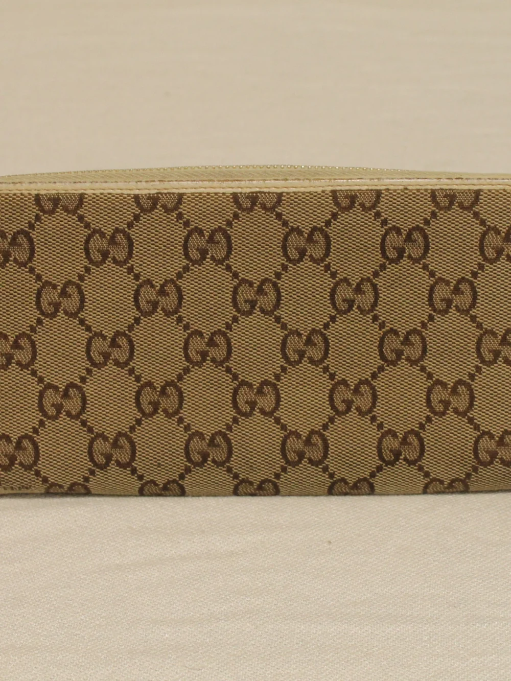 Gucci Brown Signature Canvas Zip Wallet